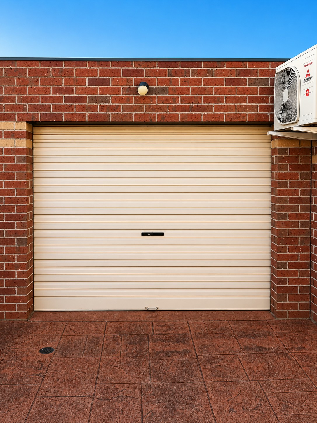 A well-maintained garage roller door on a home in Melbourne's western suburbs
